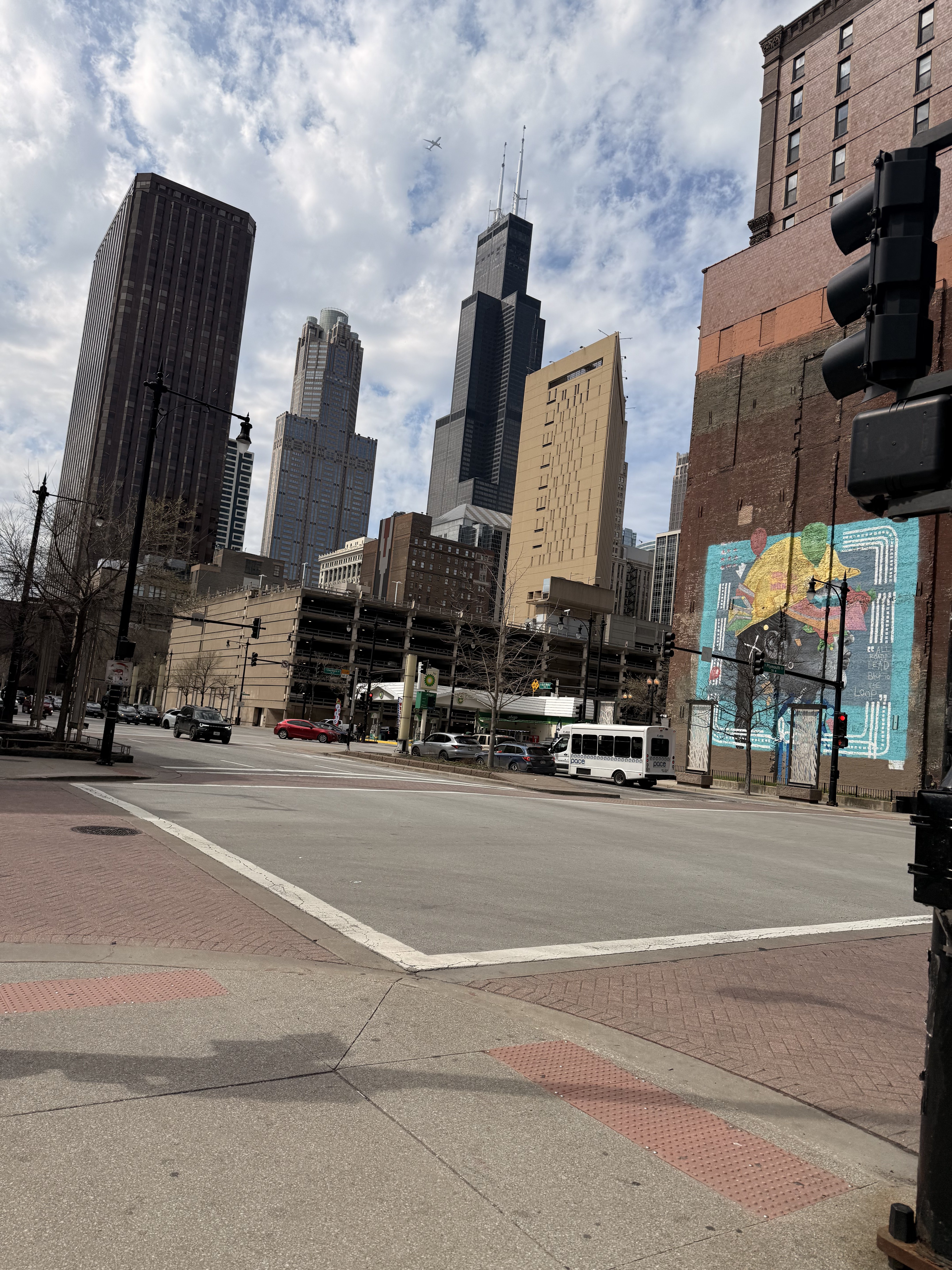Chicago street view with Willis Tower and a mural